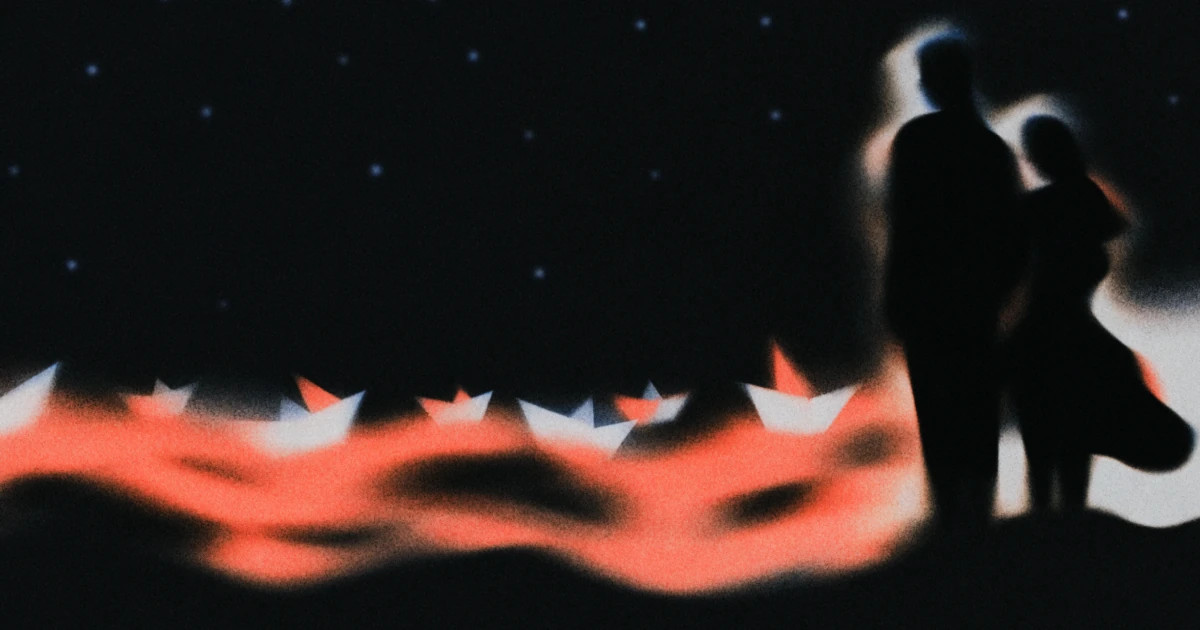 Two figures watching a line of white paper boats travel a glowing vermilion current under a starfield.